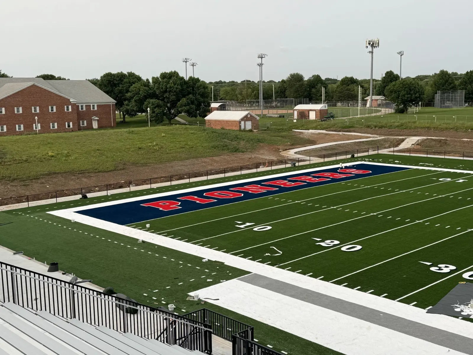 Rubber zones, turf lanes, hybrid layouts